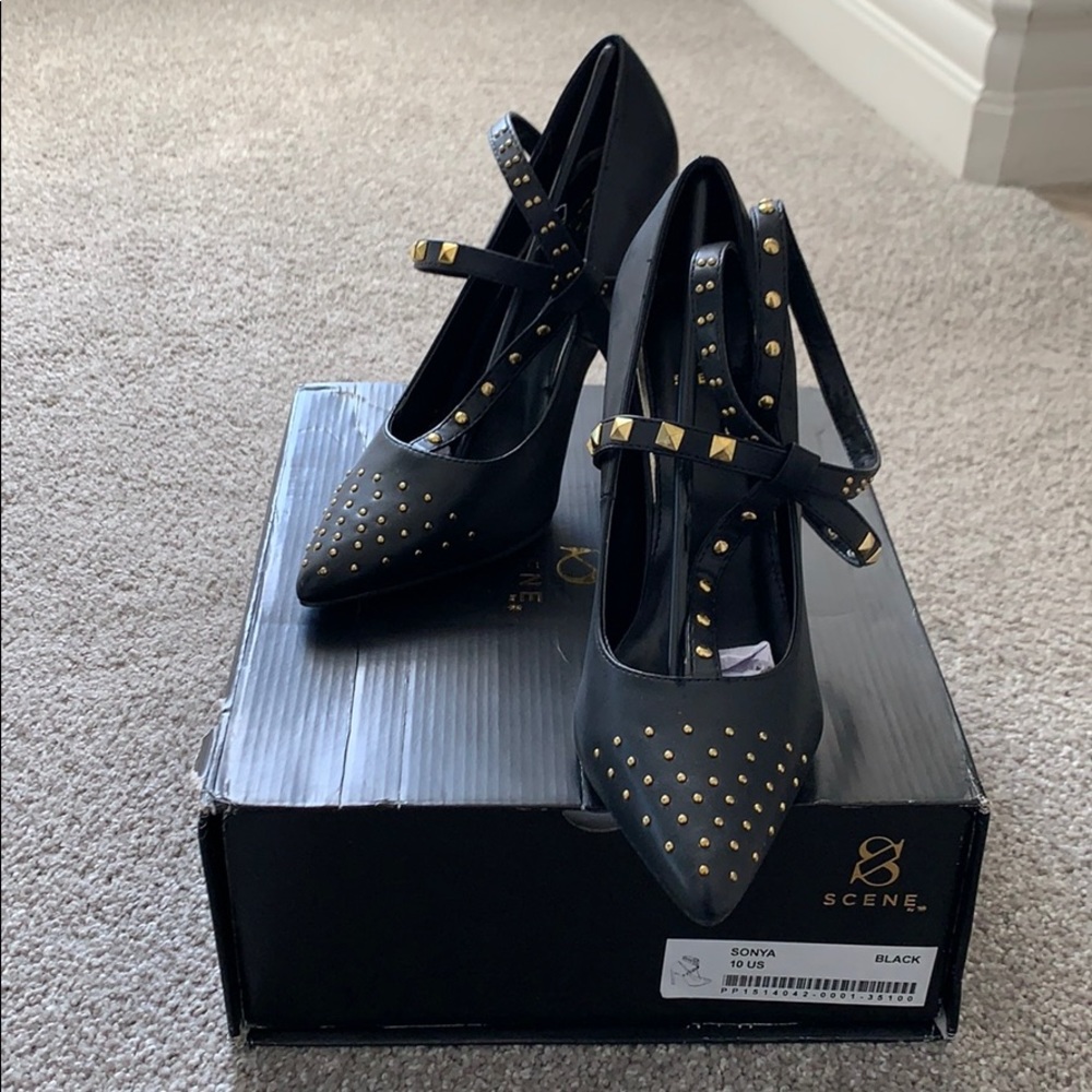 Women’s black and gold studded heels